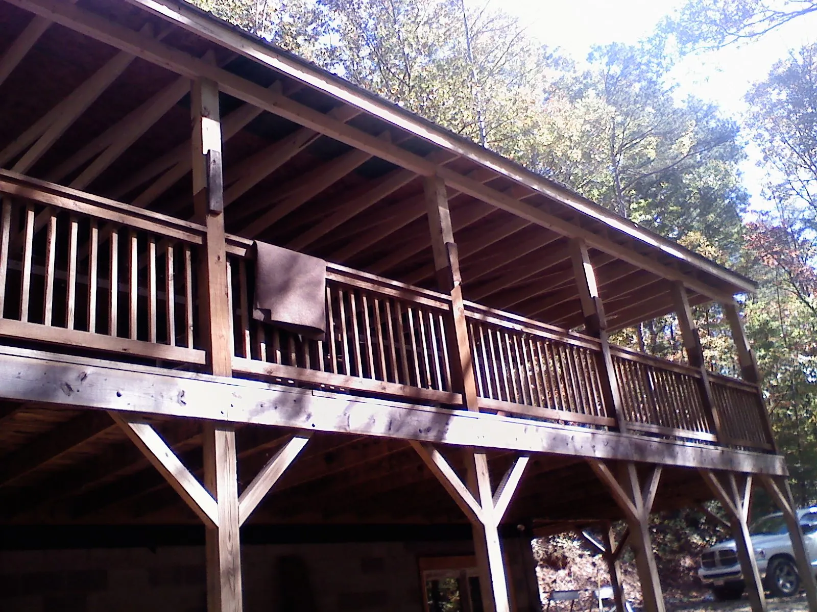 Timber framing under a new elevated porch and deck — Roof Leak Repair in Staffordsville by Roofing Brothers